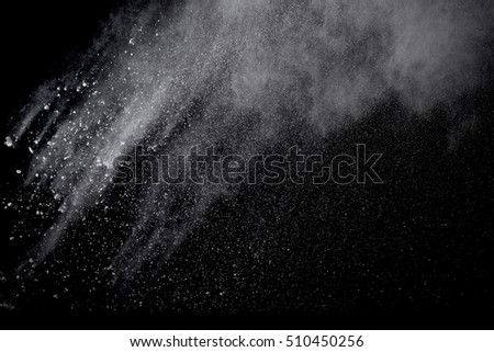 powder splatted background,Freeze motion of white powder exploding/throwing white powder,White powder explosion isolated on black background.