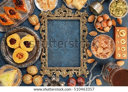 Large set of Eastern, Arab, Turkish sweets with frame top view copy space