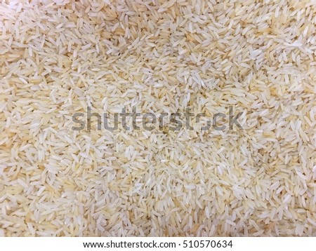 closeup white long rice background, cereals, raw rice