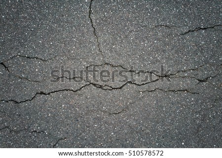 cracked gray asphalt background