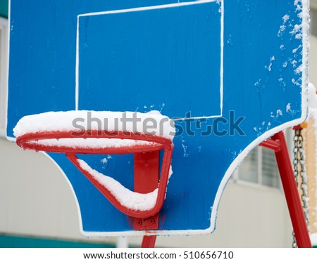 child basketball equipment in the snow
