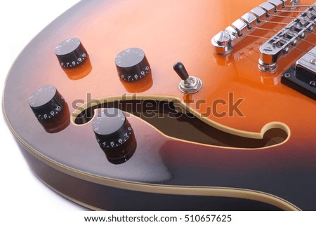 The electric jazz guitar close up.