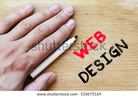 Human hand over wooden background and web design text concept