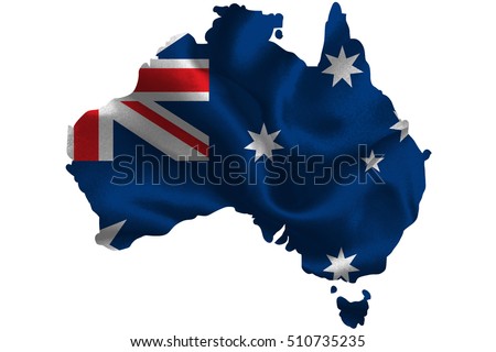 Map of Australia with national flag on fabric surface.