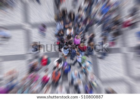 crowd of people on the street from above, blurred people