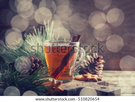 holiday tea and festive elements of home decor. Christmas card. bokeh effect Royalty-Free Stock Photo #510820654