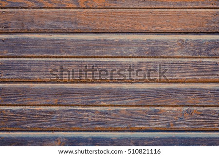 Horizontal wood plank fence close up. Detailed background photo texture. Wooden wall abstract background.