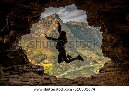 Girl being active on hike in Wallys Cave, Cape Town South Africa Royalty-Free Stock Photo #510831694