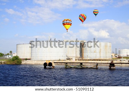 oil tanks in the port of Tampa Florida on a cloudy day