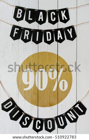 Black Friday ninety percent Discount paper banner garland lettering hanging on white barn wood planks background. Luxurious vertical shopping flyer.