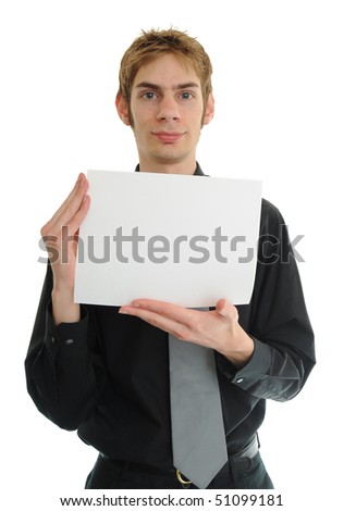Young adult man in black suit and tie holds a white blank piece of paper