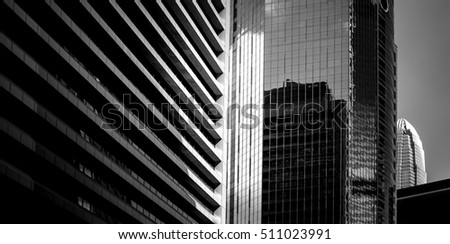 windows of business building in Hong Kong with B&W color