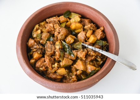 Traditional hot and spicy beef/mutton/lamb/buffalo/pork pepper fry/roast in clay pot, Kerala India. Slow cooked meat cuisine/food using Indian spices/masala for Ramadan/Ramzan, Eid, Christmas, Easter 