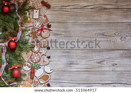Christmas holiday background with copy space. Homemade cookies, Christmas fir, tree and Christmas spices.