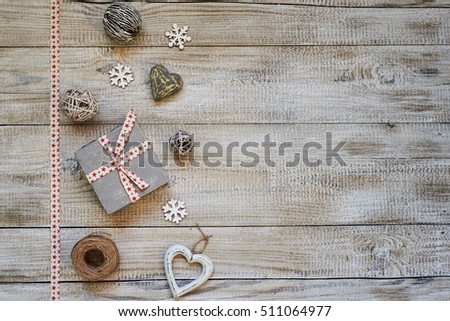 Christmas decoration with gingerbread cookies,fir branches and spices on the old wooden board. Vintage style. 

