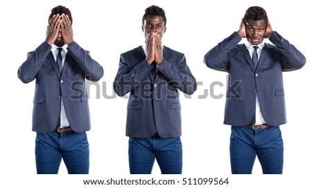 Handsome black man covering his mouth, ears and eyes