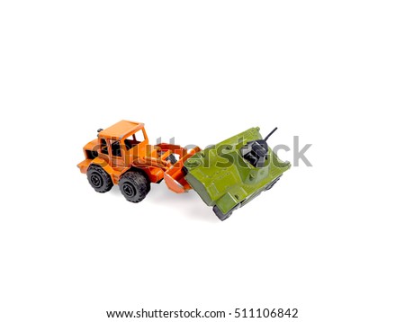 Kids Toy Tractors.Toy heavy excavator isolated.Yellow tractor toy on a white.Military Tank Simulator