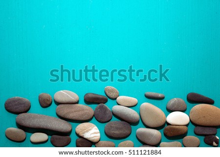 background in marine colours with sea pebbles