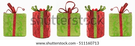 Sparkling Christmas gift box isolated on white background.Cut out xmas presents boxes.Shiny bright decorative New Year toy package.Celebrate winter holidays with decorated toys