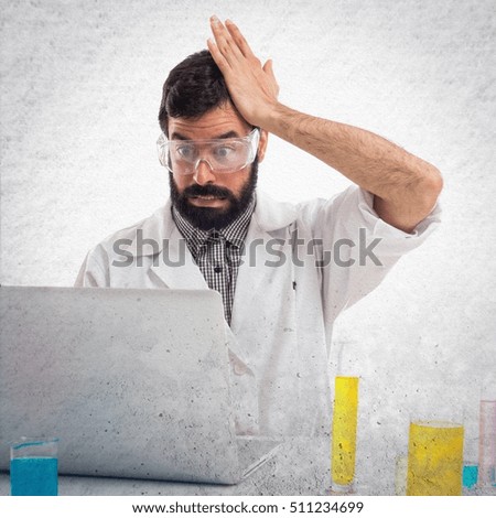 Scientist man having doubts on textured background