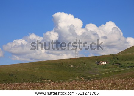 abstract of beautiful landscape and grassland with cloud on the hill background with blue sky at Yarchen Gar ( The Giant Monasteries of Kham). a famous Lamasery in Baiyu, Sichuan,-filter image 
