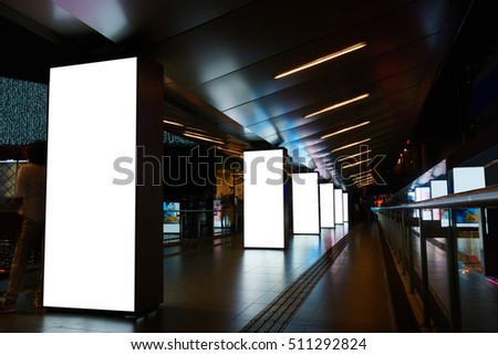 Digital billboards with clear copy space screen background for your text message or information content, electronic banner in night city, empty poster in metro setting, blank advertising mock up 