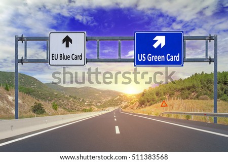 Two options EU Blue Card and US Green Card on road signs on highway