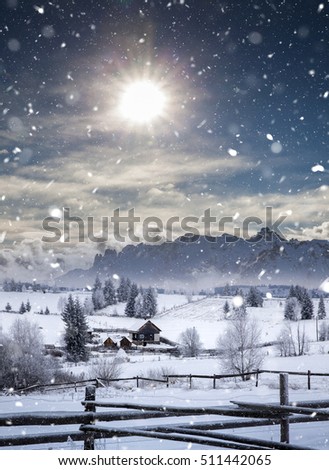 Christmas background with snowy trees. Heavy snowing in the mountains.