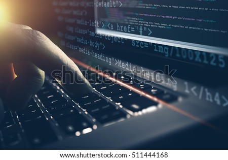 Web Development Work Concept. HTML Programming Job. Programmer Working on His Laptop Computer Concept.