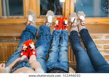 family lying near the window