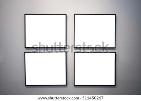 blank photo frame on the wall