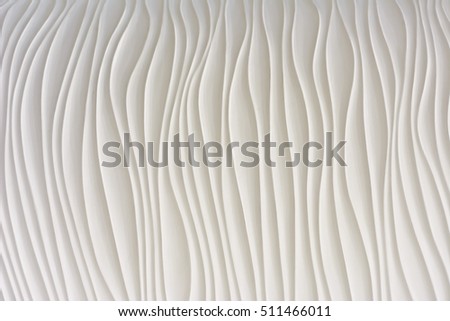 Clay wall texture with wavy lines in white.