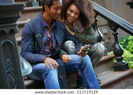 Mixed-race couple taking selfie picture 