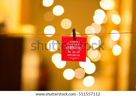 Merry Christmas and Happy New Year on bokeh background, festive defocused lights.
 Royalty-Free Stock Photo #511557112