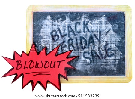 Rough textured slate blackboard with black Friday message added in white chalk. There is a bright red starbust lower left announcing blowout