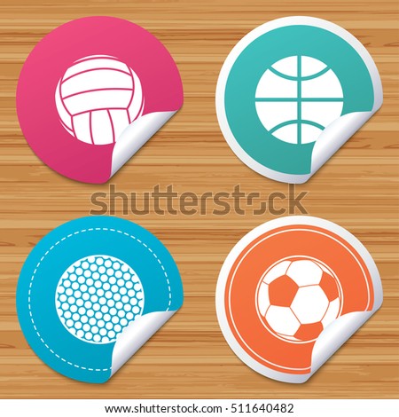 Round stickers or website banners. Sport balls icons. Volleyball, Basketball, Soccer and Golf signs. Team sport games. Circle badges with bended corner. Vector