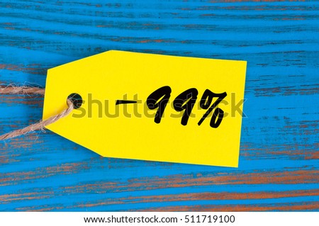 sale minus 99 percent. Big sales 99%, ninety nine percents on blue wooden background for flyer, poster, shopping, sign, discount, marketing, selling, banner, web, header