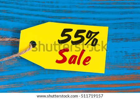 sale minus 55 percent. Big sales 55%, fifty percents on blue wooden background for flyer, poster, shopping, sign, discount, marketing, selling, banner, web, header