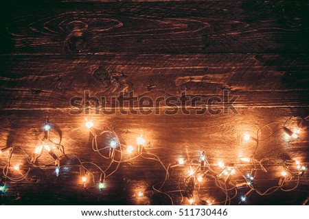 Christmas lights background. Merry christmas (xmas) background. Old wood texture - vintage styles