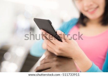 Happy woman shopping, selfie and use smart phone in the mall, asian