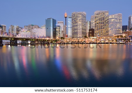 Landscape of Darling Harbor with Sydney central business district at dusk in Sydney, New South Wales, Australia. No people. Copy space Royalty-Free Stock Photo #511753174