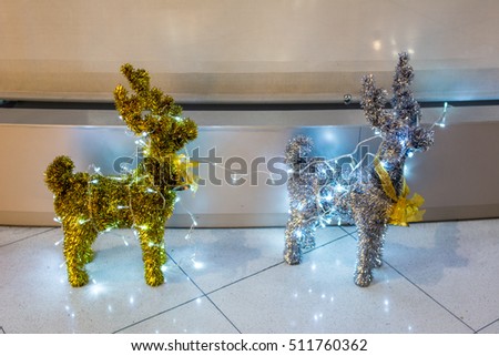 Reindeer Decoration. Figurine of Christmas deer sparkling light.
