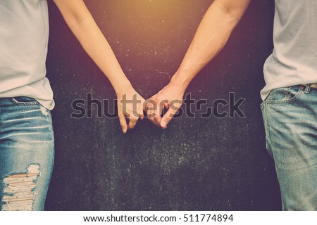 Valentine day background. Love couple in vintage filter Royalty-Free Stock Photo #511774894
