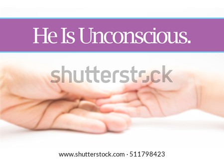 He Is Unconscious. - Heart shape to represent medical care as concept. The word He Is Unconscious. is a part of medical vocabulary in stock photo.