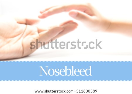 Nosebleed - Heart shape to represent medical care as concept. The word Nosebleed is a part of medical vocabulary in stock photo.