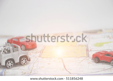 plastic car toy background to travel concept.