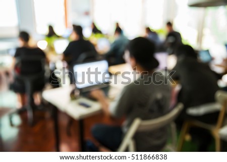 Abstract blur people lecture in seminar room with notebook or laptop computer, education or business training concept