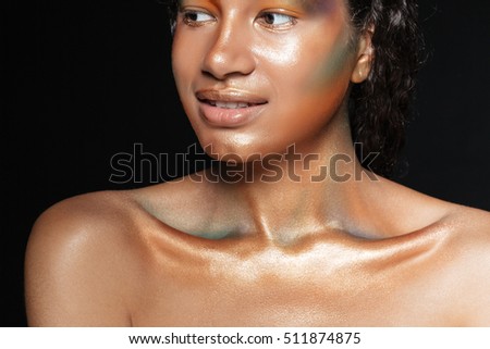 Beauty portrait of cute african american young woman with shining makeup