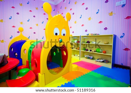 Interior of children's room with many toys.