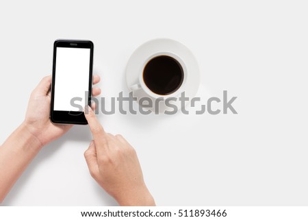 Design concept of mockup using smartphone and coffee set isolated on white background. Clipping Path included on white background. Copyspace for your text.